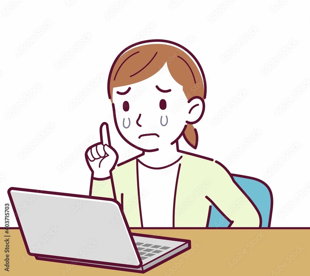 Young woman in a cardigan_laptop Young woman in a cardigan_laptop