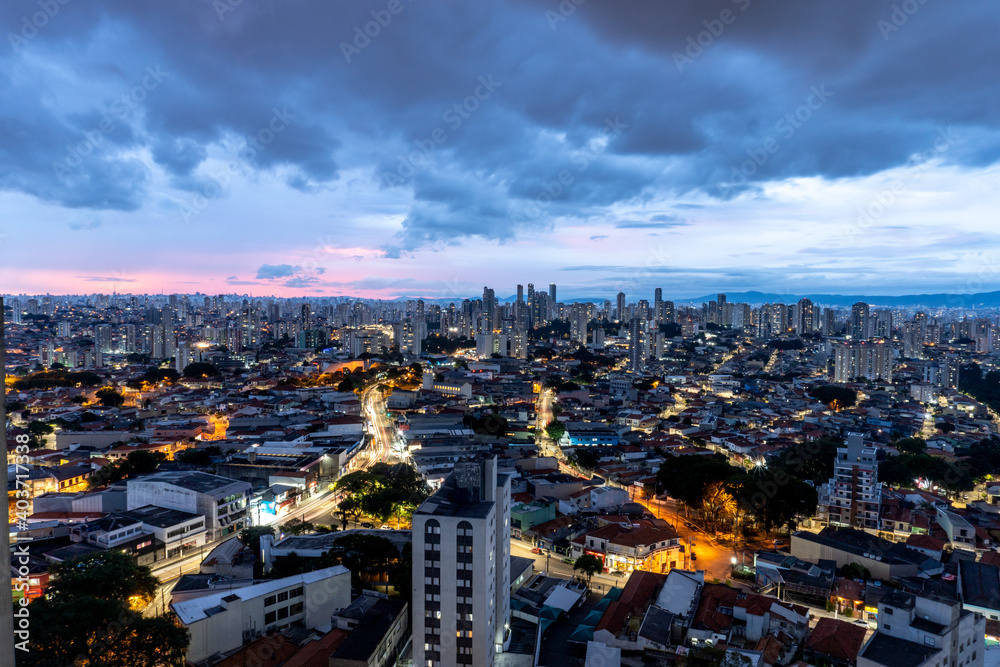 São Paulo with sunset and pink sky and night, metropolis, South America, Brazil