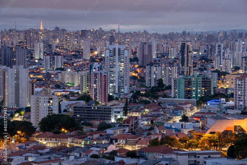 São Paulo with sunset and pink sky and night, metropolis, South America, Brazil