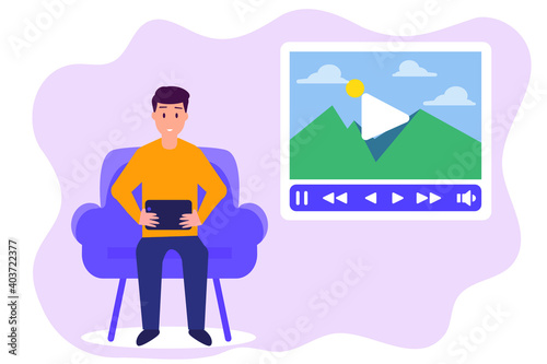 Young man watching online video on tablet 2D flat vector concept for banner, website, illustration, landing page, flyer, etc.