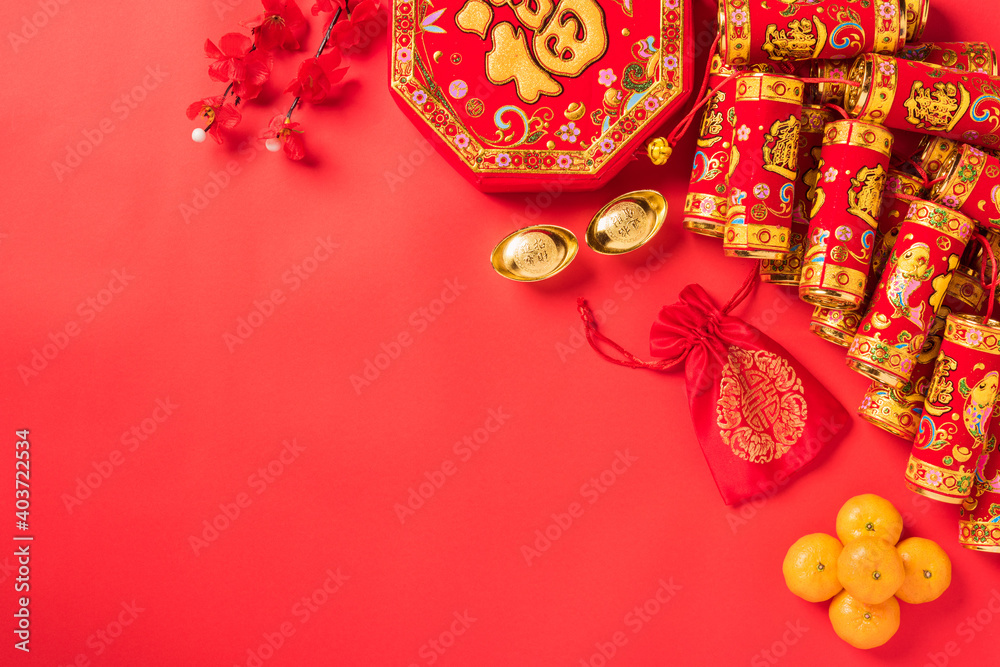 Chinese new year 2021 festival, Top view flat lay lunar new year or Happy Chinese new year decorations celebration with copy space on red background (Chinese character 