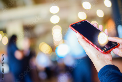 blurred restaurant or coffee shop with crowed customer background for product display montage