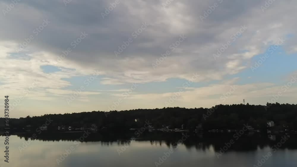 Nature drone shot of lake panning over beach. Nature drone shot of lake panning over beach.