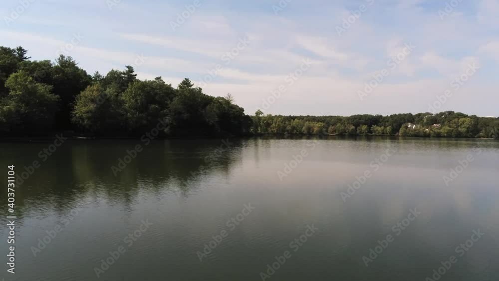 Spiral drone shot around the lake. Spiral drone shot around the lake.