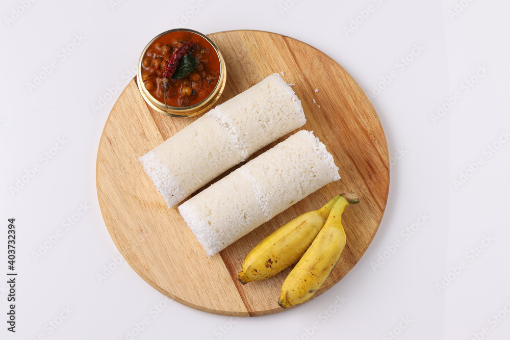 Fototapeta premium White rice puttu with chana curry