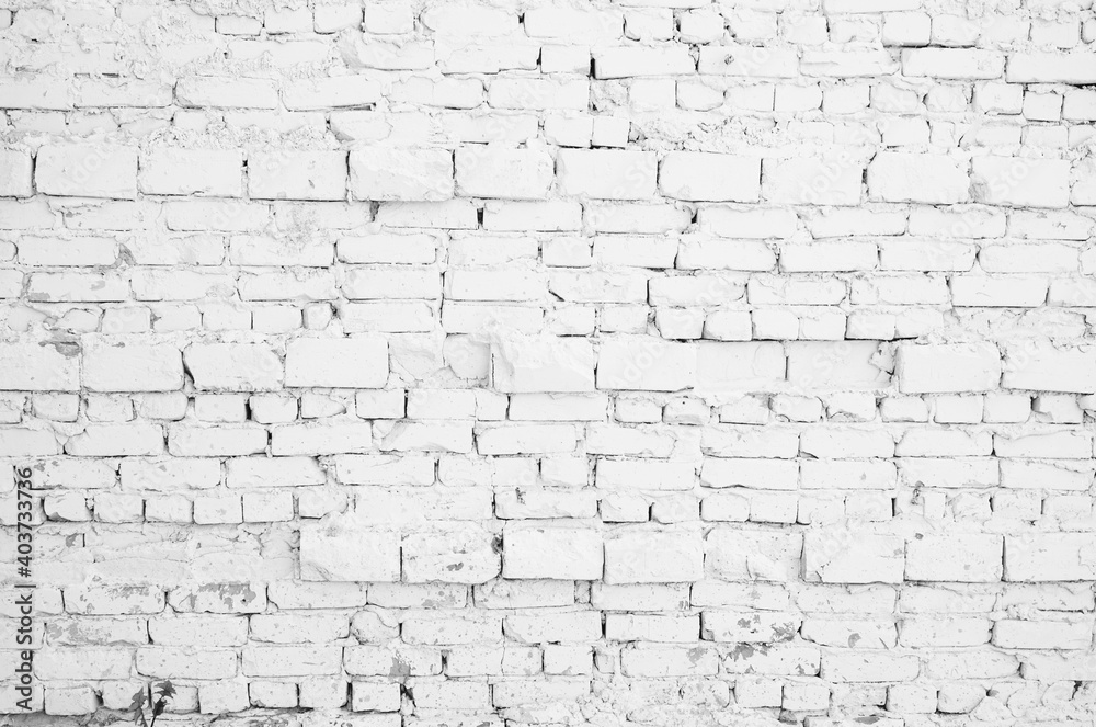Black gray brick wall background. Monotone texture of a flat brick wall close-up. Black gray brick wall background. Monotone texture of a flat brick wall close-up.