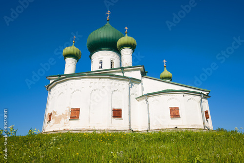 Ancient Church of the Nativity of John the Baptist close-up on a sunny June day. Staraya Ladoga, Russia photo
