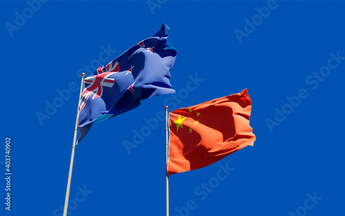 Flags of New Zealand and China.