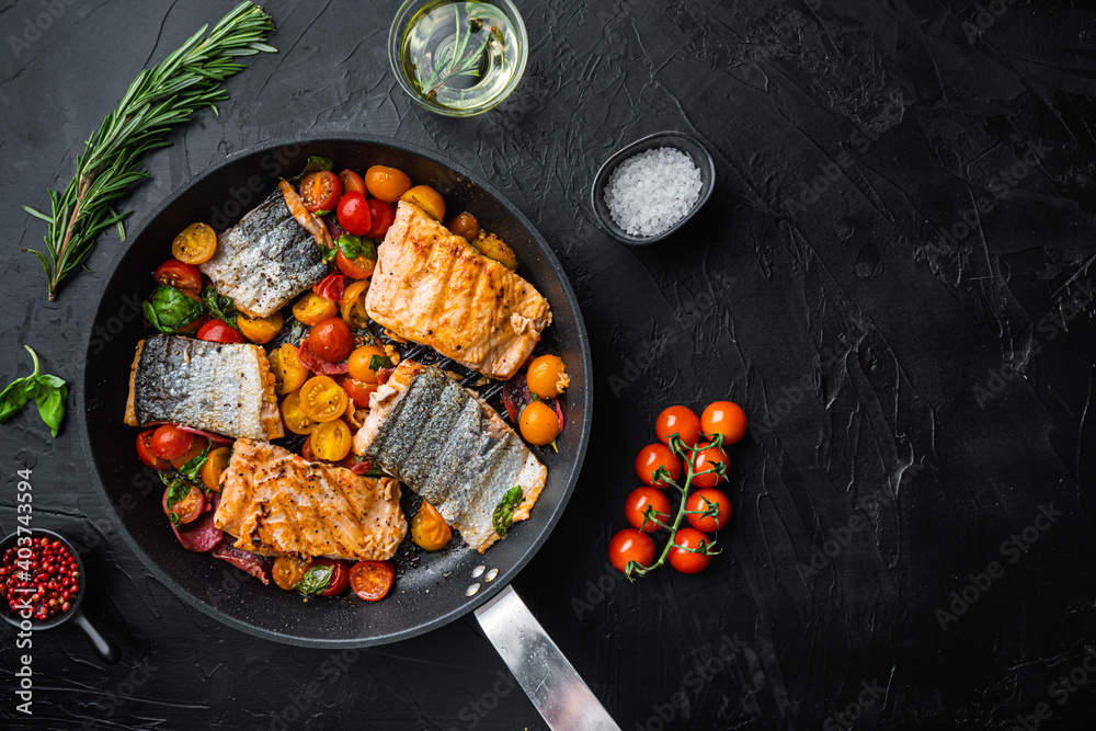 Smoky chorizosalmon grilled with cherry tomatoes on black background, flat lay with space for text