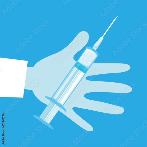 Syringe with vaccine in hand of doctor on blue background.