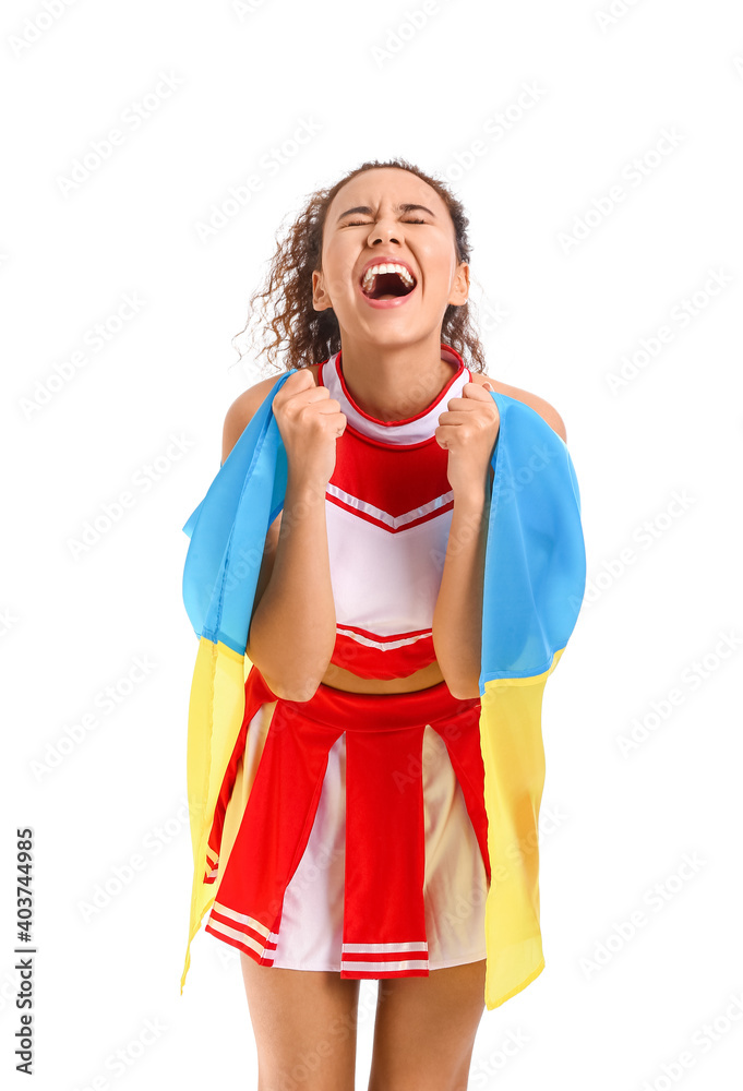 Emotional cheerleader with the flag of Ukraine on white background Emotional cheerleader with the flag of Ukraine on white background