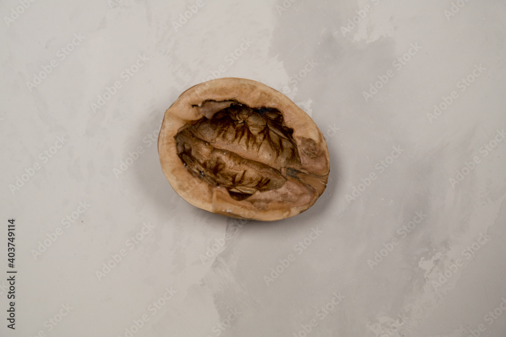 Chopped nuts on a neutral gray background, nutshells Chopped nuts on a neutral gray background, nutshells