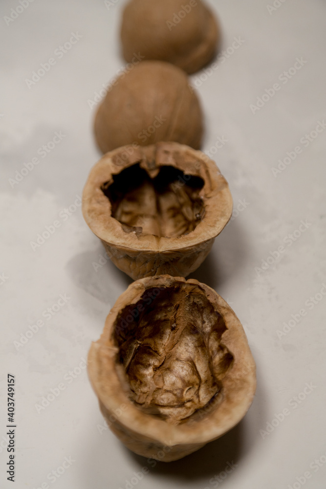 Chopped nuts on a neutral gray background, nutshells Chopped nuts on a neutral gray background, nutshells