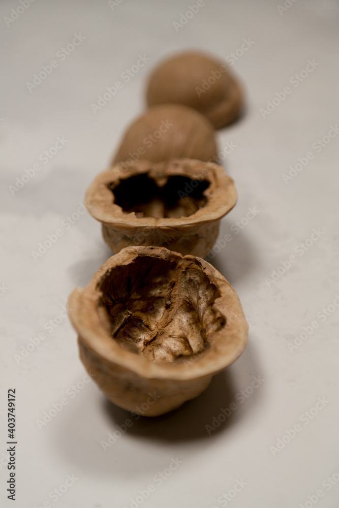 Chopped nuts on a neutral gray background, nutshells Chopped nuts on a neutral gray background, nutshells