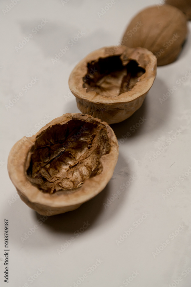 Chopped nuts on a neutral gray background, nutshells Chopped nuts on a neutral gray background, nutshells