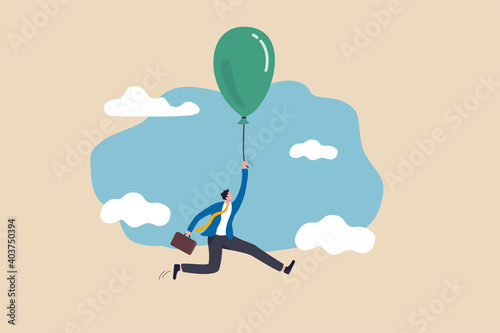 Financial bubble by QE injected money concept, businessman investor holding flying balloon tight afraid to fall off.