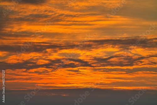 Sunset sky and clouds. Fantastic landscape with sunset. This texture is suitable for background or material. 