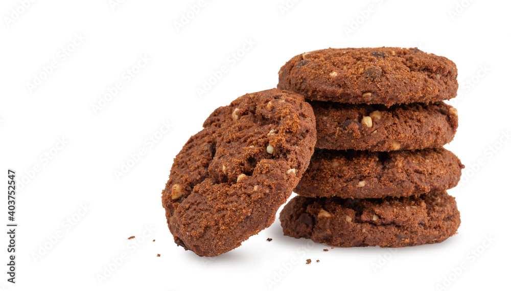 rich round cookies with nuts and chocolate, lying on a wooden plate, isolate on a white background rich round cookies with nuts and chocolate, lying on a wooden plate, isolate on a white background