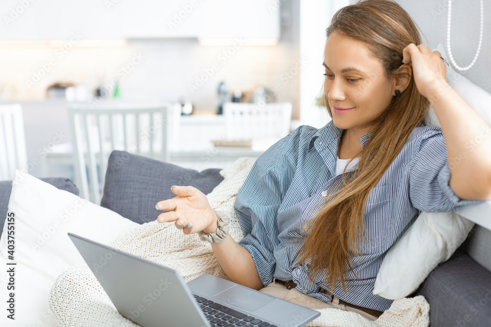 Caucasian woman during an online conversation. Caucasian woman during an online conversation.