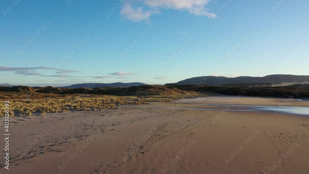 The coast between Kiltoorish bay beach and the Sheskinmore bay between Ardara and Portnoo in Donegal - Ireland The coast between Kiltoorish bay beach and the Sheskinmore bay between Ardara and Portnoo in Donegal - Ireland