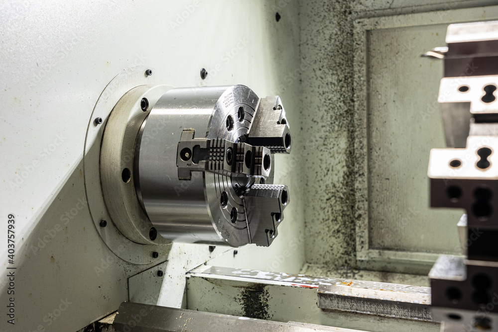 Cnc machine. The CNC lathe machine or Turning machine. Turning numerical control machine with tools and chuck. Cnc machine. The CNC lathe machine or Turning machine. Turning numerical control machine with tools and chuck.