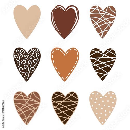 Vector set with chocolate colors decorated hearts isolated on white background for Valentines day, love design. Hand drawn hearts of different ethnicity colors. Graphic elements, Stop racism concept.