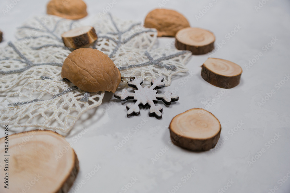glass bottle without inscriptions on a light background with wooden circles and a white sheet glass bottle without inscriptions on a light background with wooden circles and a white sheet