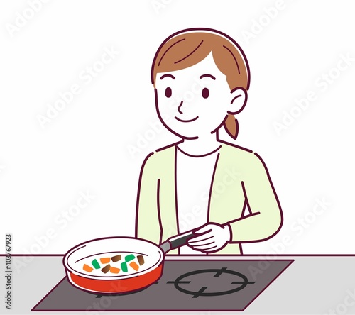 Young woman in a cardigan_cooking