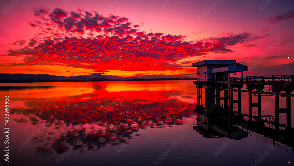 The background of the bridge stretches into the sea, with twilight light in the morning, beautiful colors, sky wallpaper and refreshing surroundings. The background of the bridge stretches into the sea, with twilight light in the morning, beautiful colors, sky wallpaper and refreshing surroundings.