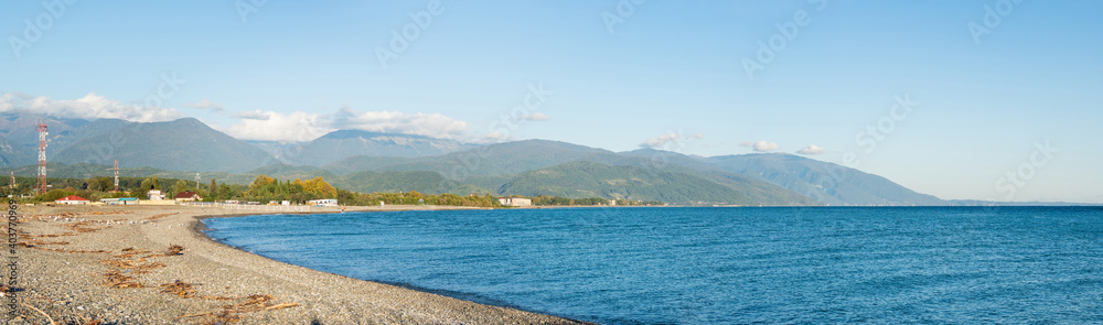 Panoramic view of state border between Russia and Abkhazia, passing along the rocky beach of Adler town. The Black Sea coast of Sochi.