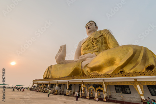 Gautama Buddha statue at Kyaikto, Myanmar photo