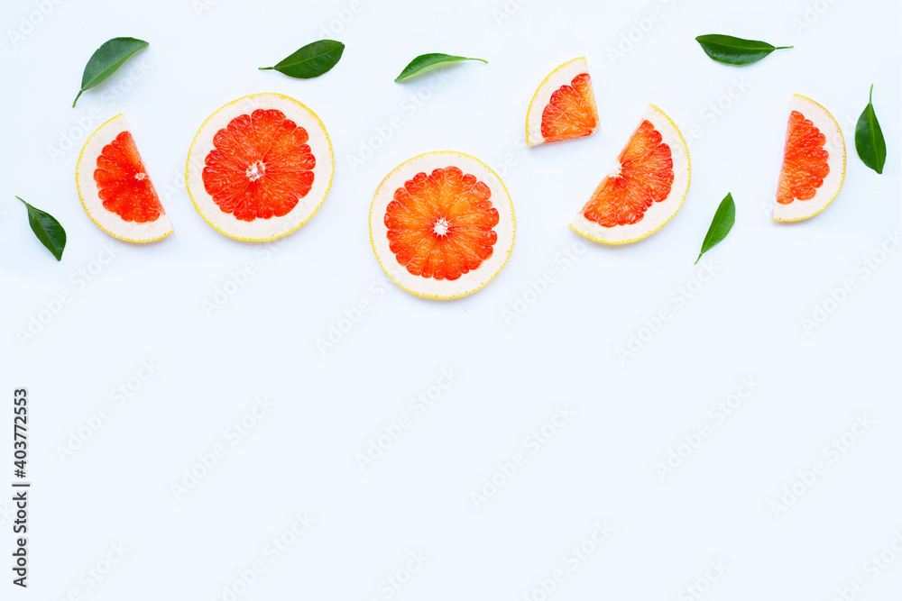High vitamin C. Juicy grapefruit slices on white.
