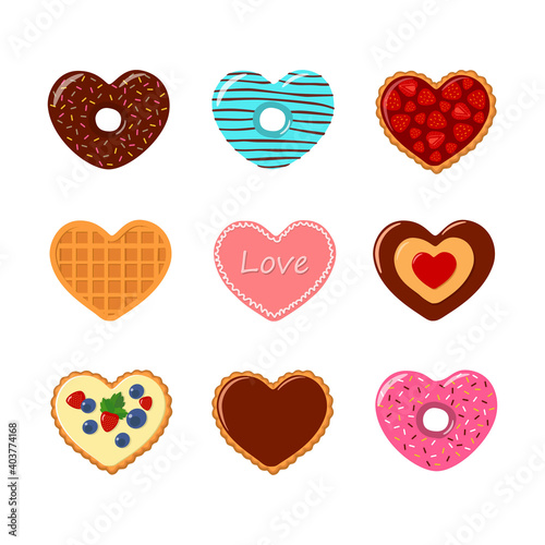 Valentines day.  Set of cookies and waffles in heart shaped with strawberries and chocolate