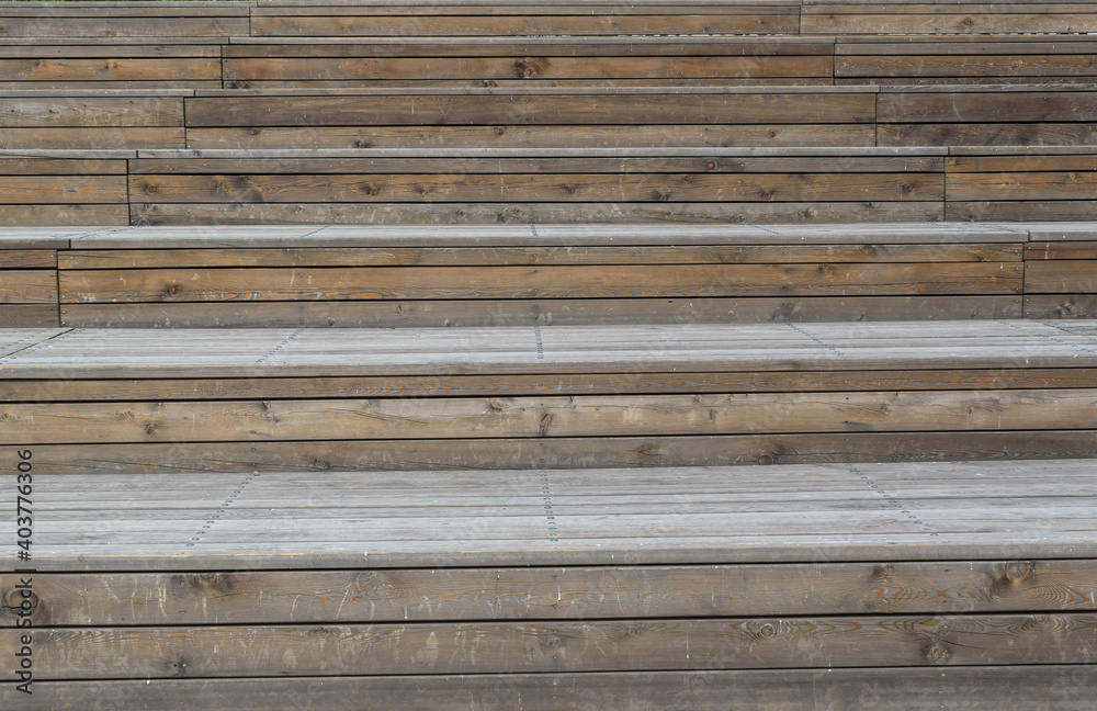Wooden stairs up. The boards are fastened with screws and bolts. Wooden stairs up. The boards are fastened with screws and bolts.