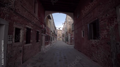 Wallpaper Mural Walking with steadycam steadicam in picturesque scenic narrow streets with traditional colorful houses of Venice town in famous tourist attraction, Italy. Torontodigital.ca