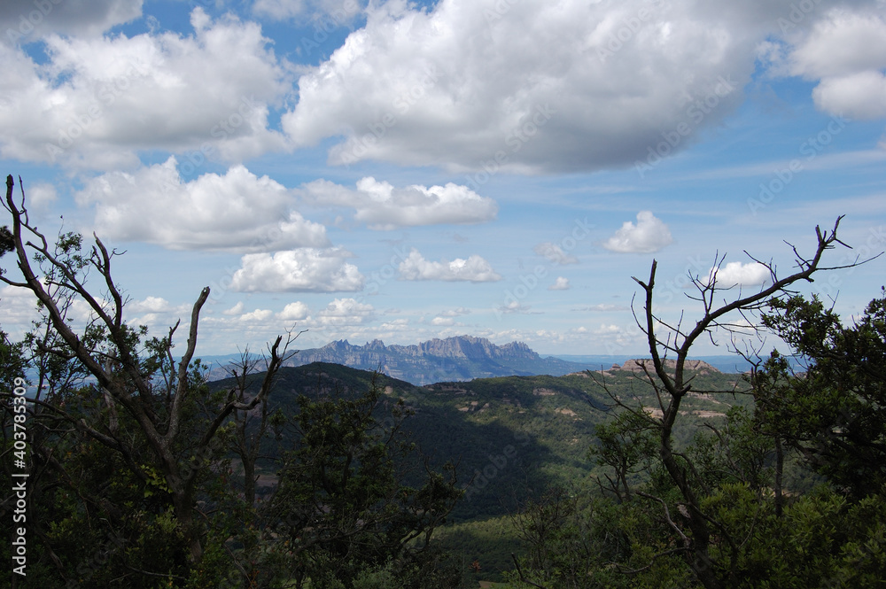 Obraz premium Panorama of the mountains and forests of La Mola, in Catalonia. View of Montserrat. Catalunya, Bages, Barcelona. 