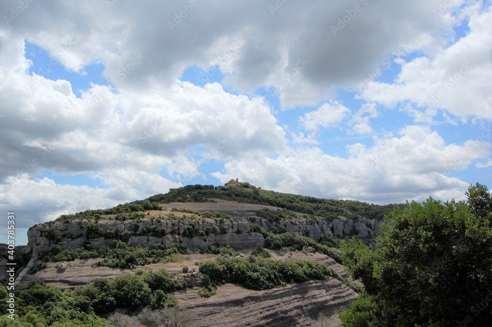 Panorama of the mountains and forests of La Mola, in Catalonia. Sanctuary of La Mola, at the top of the mountain. Catalunya, Bages, Barcelona.
