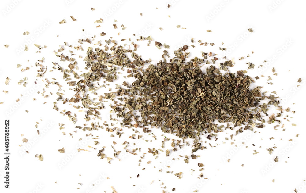 Dried and chopped basil spice pile isolated on white background, top view Dried and chopped basil spice pile isolated on white background, top view