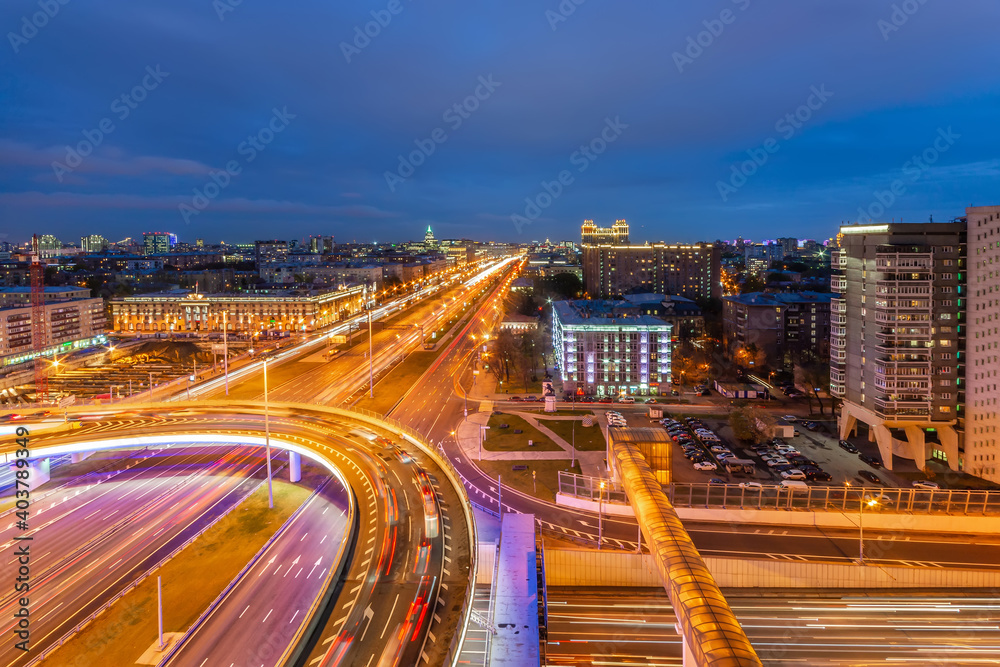  Big city lights. Multi-level junction with the bright night light trails.