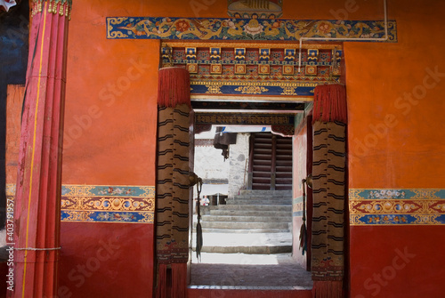 Decorative doorway with oriental details in Tibet. photo