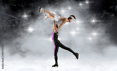 Lift. Duo figure skating in action © Andrey Burmakin