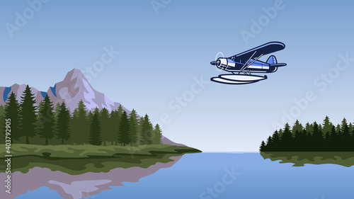 seaplane flying over the beautiful lake photo