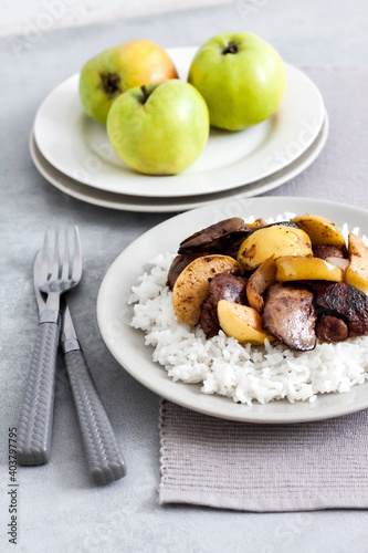Fried chicken liver with apples and onions