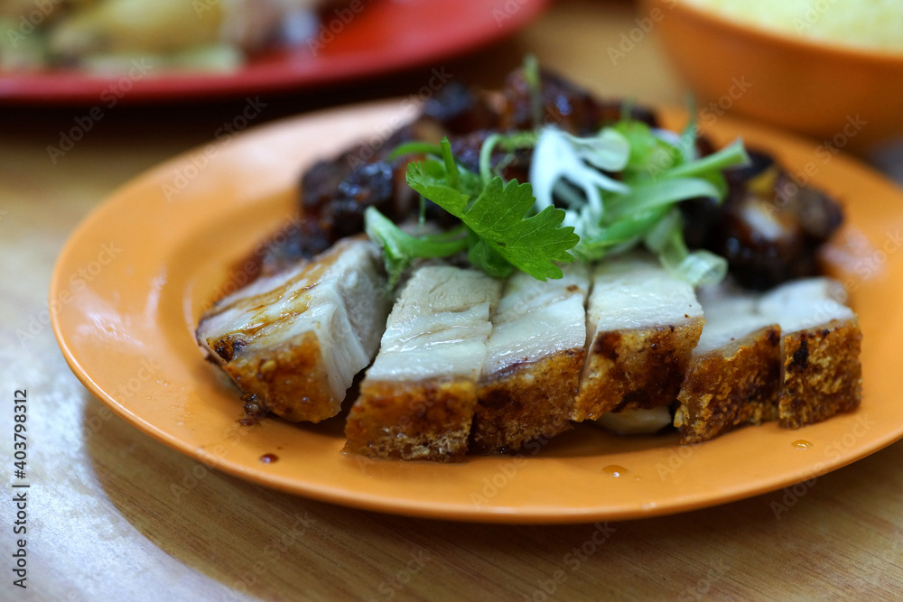 Soft focus image of crispy pork belly and flavor barbecued pork Soft focus image of crispy pork belly and flavor barbecued pork