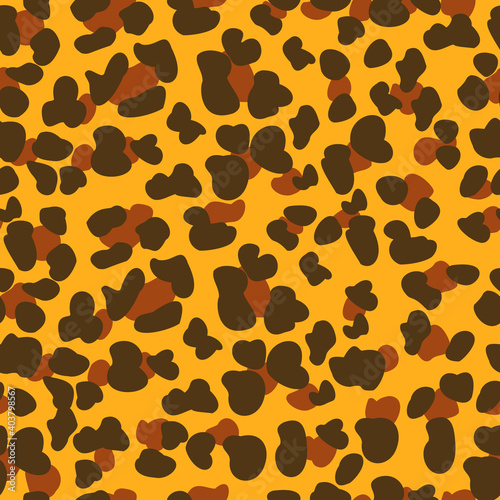 Yellow and brown spots leopard pattern design. Animal seamless texture.