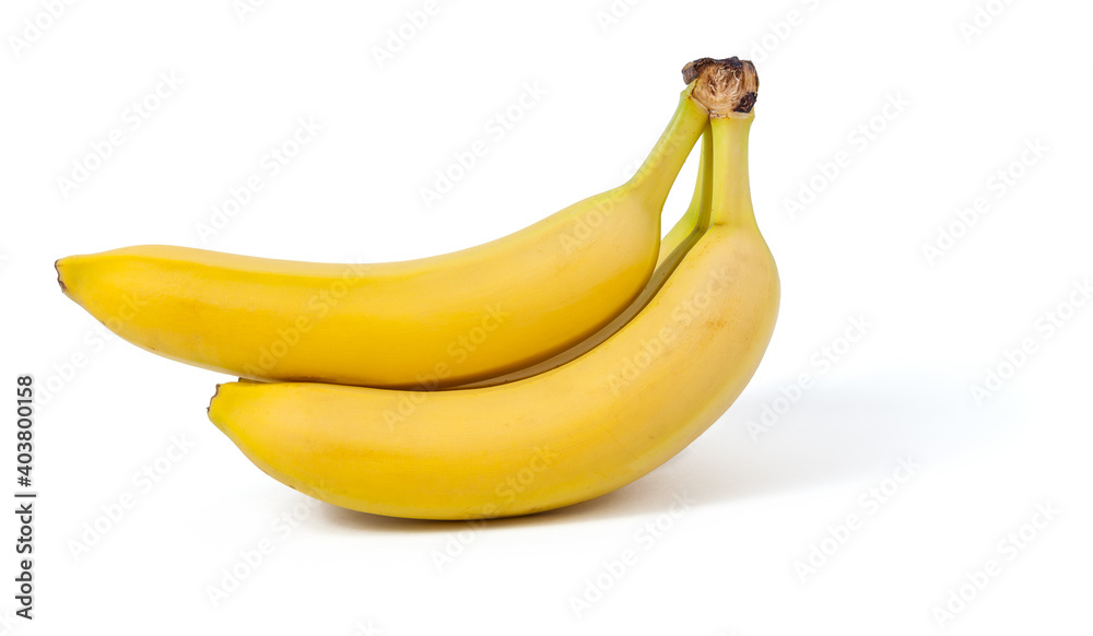 A bunch of yellow bananas three pieces on a white isolated background in a photo studio. Healthy food and vegetarianism, a healthy snack for schoolchildren.