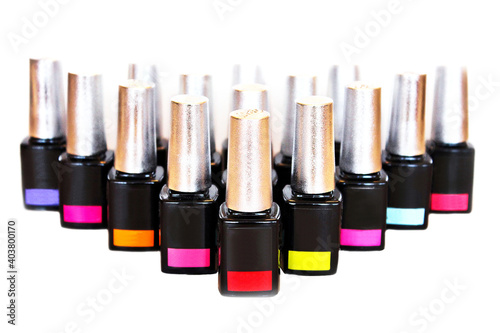 Nail polish on a white background. Large selection of nail polishes. Manicure