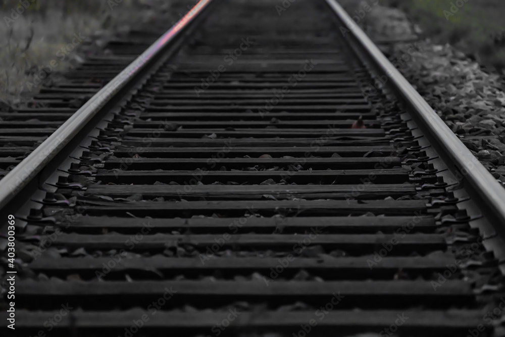 Railroad line at dusk, Close up image with blurred background.