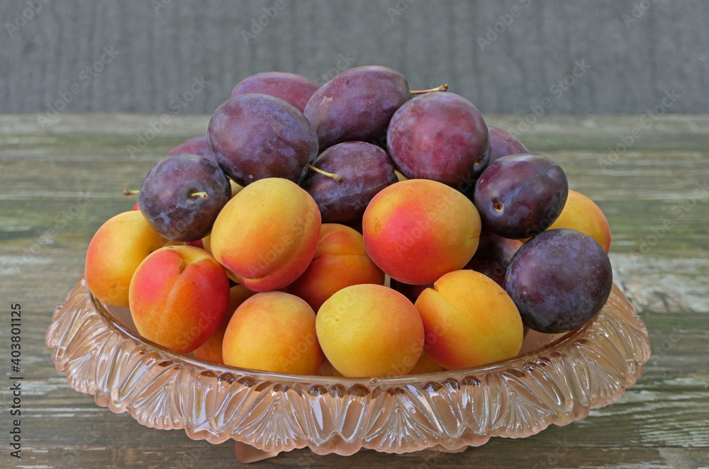 Fruit From Regional Cultivation In A Fruit Bowl, Apricots And Plums Fruit From Regional Cultivation In A Fruit Bowl, Apricots And Plums