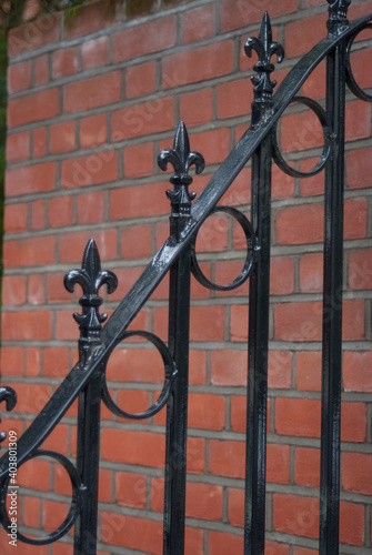 Close up of fleur de lys detail on wrought iron photo